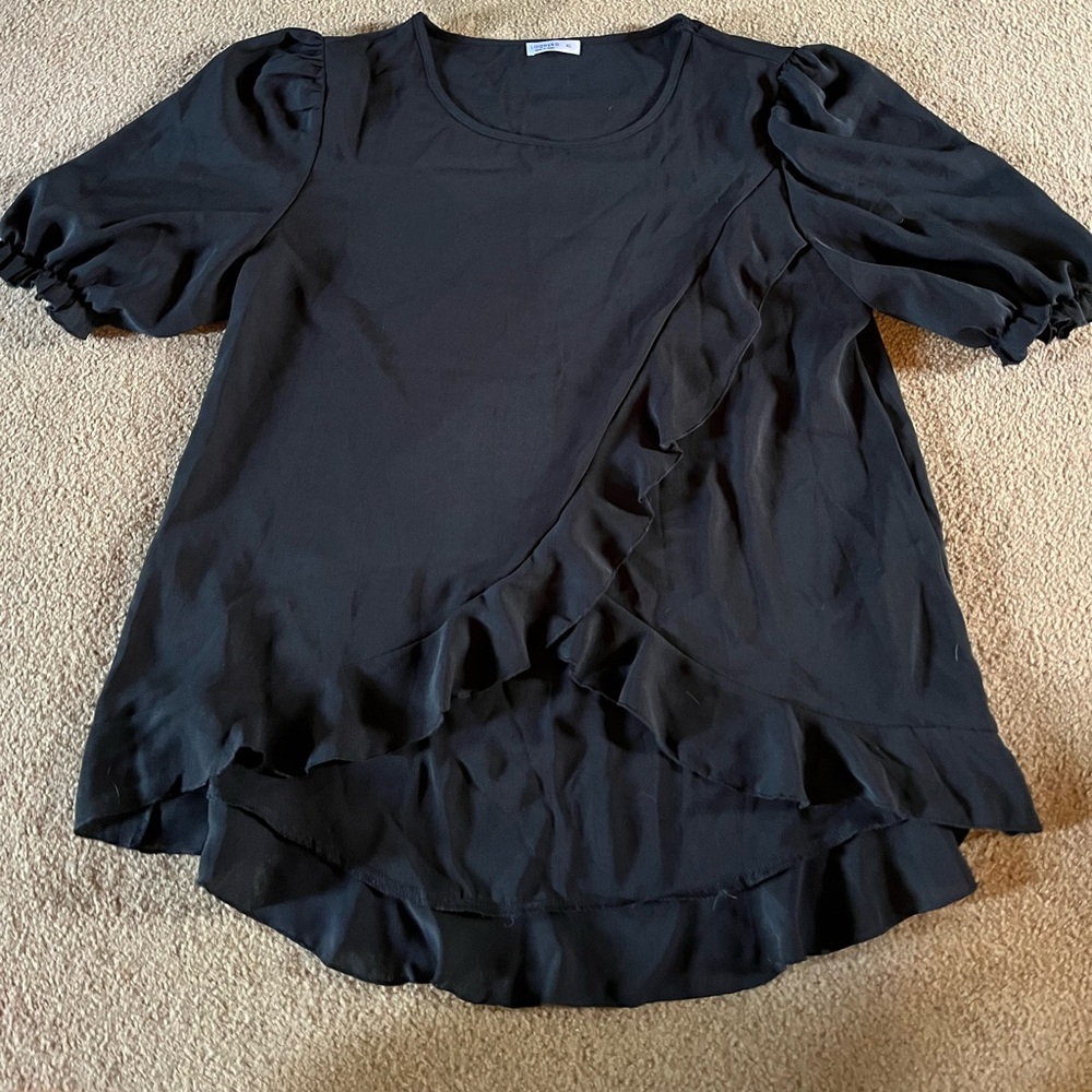 Black ruffled blouse